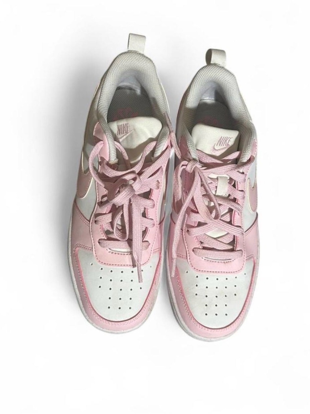 barley worn Nike  Low pink trainers. Size 7Y